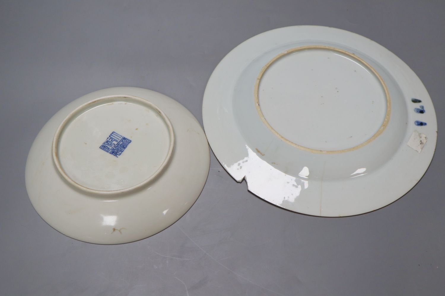 A Chinese porcelain saucer dish, 16.5cm and a Chinese export plate, 23cm